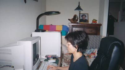 My mom working at the computer
